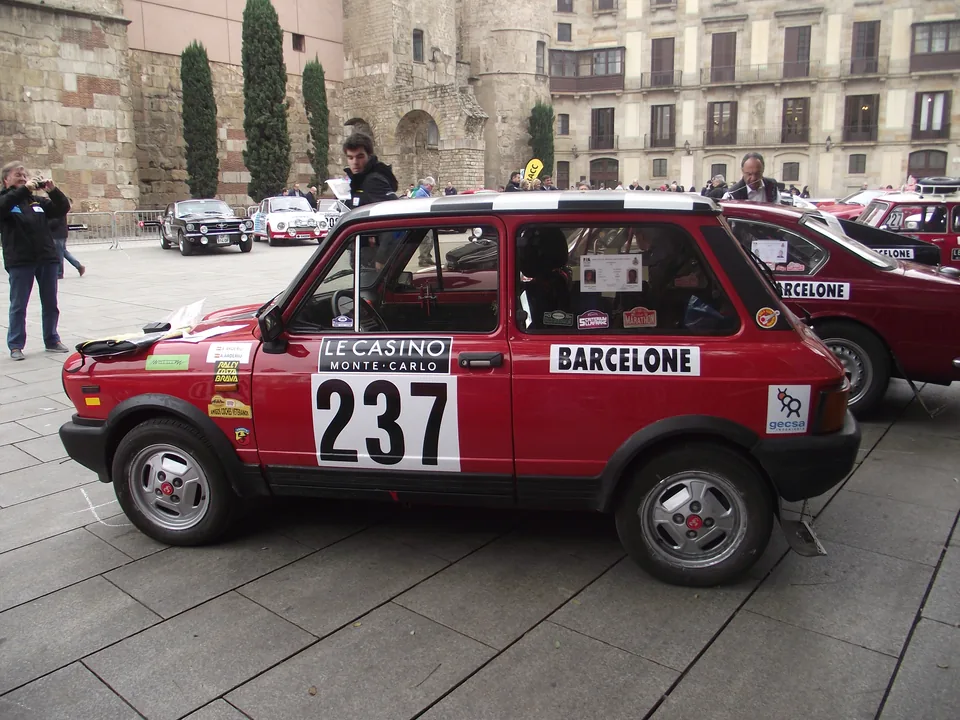 Red Autobianchi A112 Abarth rally car with number 237, side view, Rallye Monte-Carlo Historique