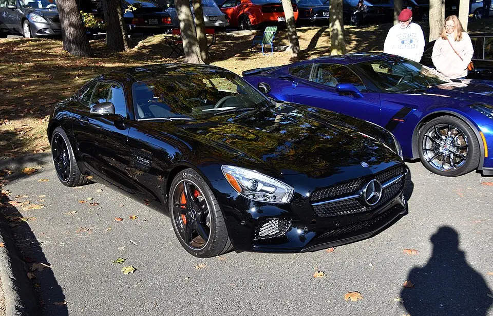 Black Mercedes-AMG GT C Coupé, three-quarter front view