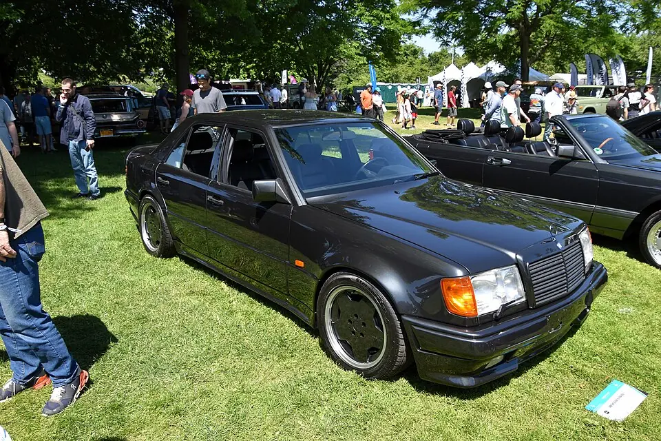 Dark grey Mercedes-AMG Hammer (W124), three-quarter front view