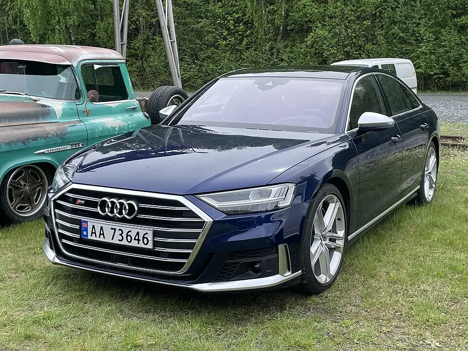 Dark blue Audi S8, three-quarter front view