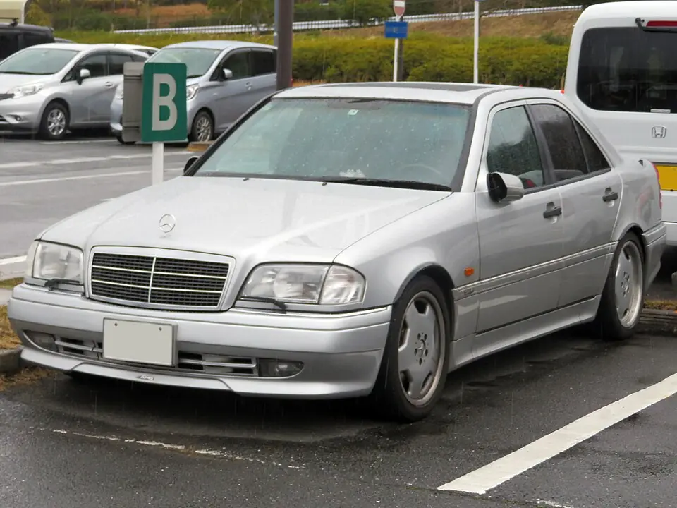 Silver Mercedes-Benz C36 AMG (W202), three-quarter front view