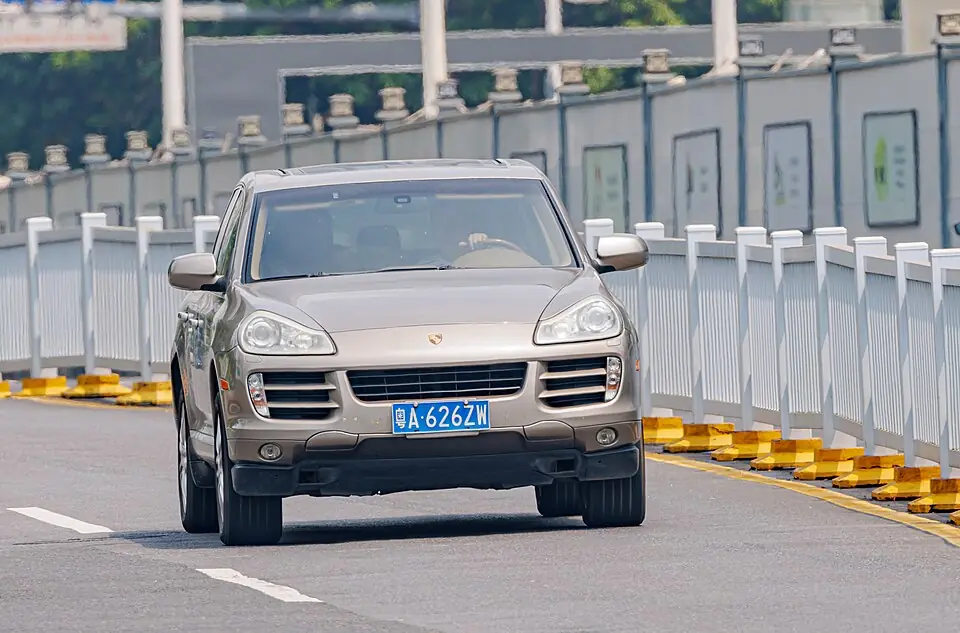 Silver first-generation Porsche Cayenne, three-quarter front view