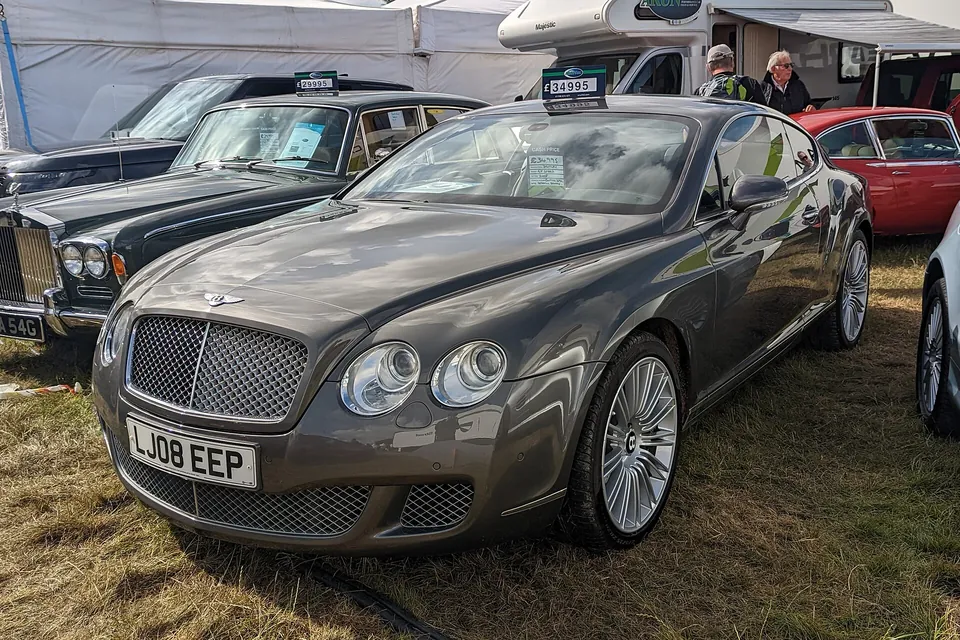 Grey Bentley Continental GT Speed, front three-quarter view
