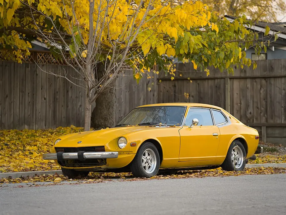 Yellow Datsun 240Z, three-quarter front view