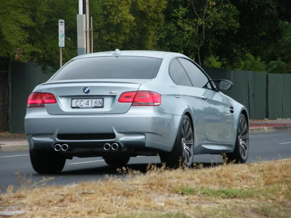 White BMW M3 E92 coupe, three-quarter front view