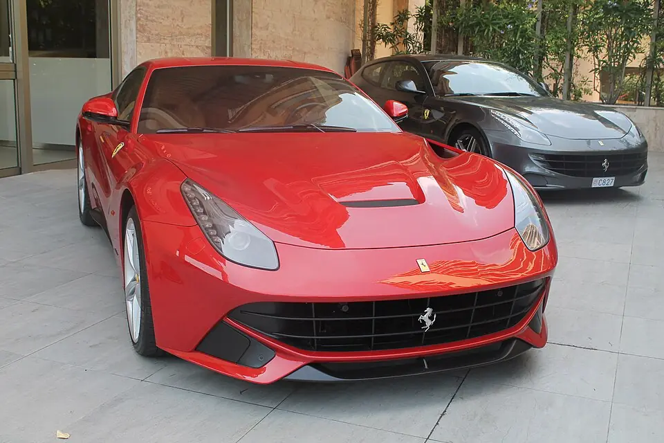 Red Ferrari F12 Berlinetta, three-quarter front view