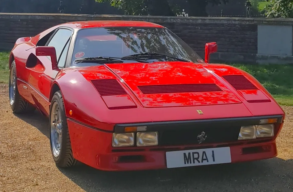 Red Ferrari 288 GTO, three-quarter front view