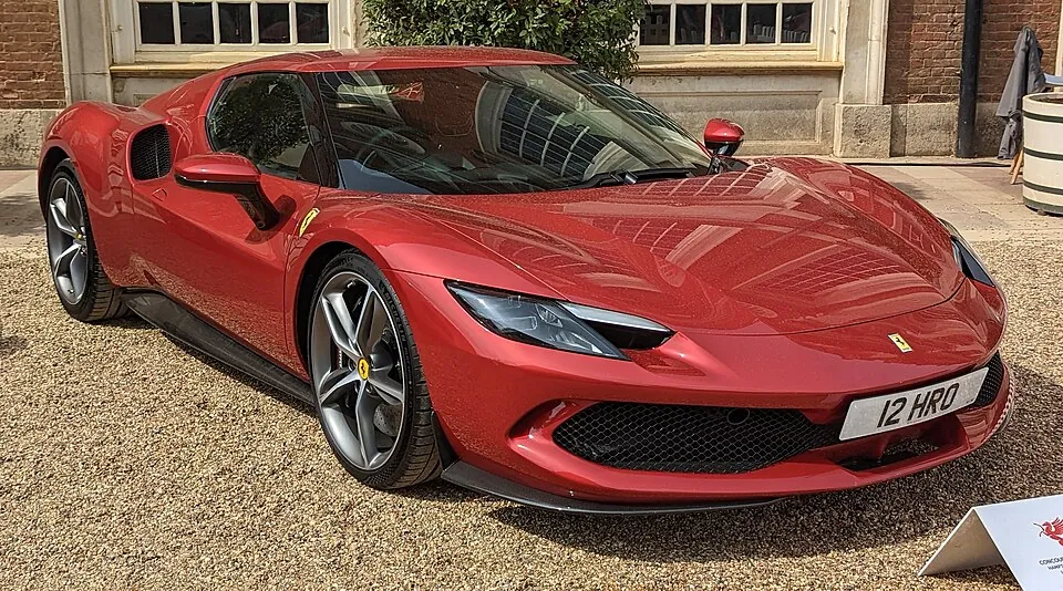 Red Ferrari 296 GTB, three-quarter front view