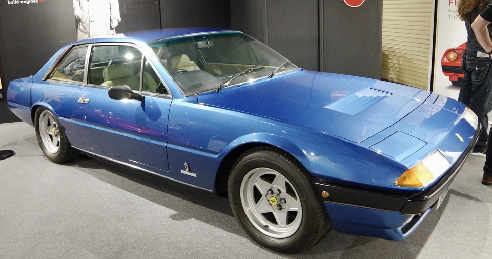 Blue Ferrari 400i, three-quarter front view
