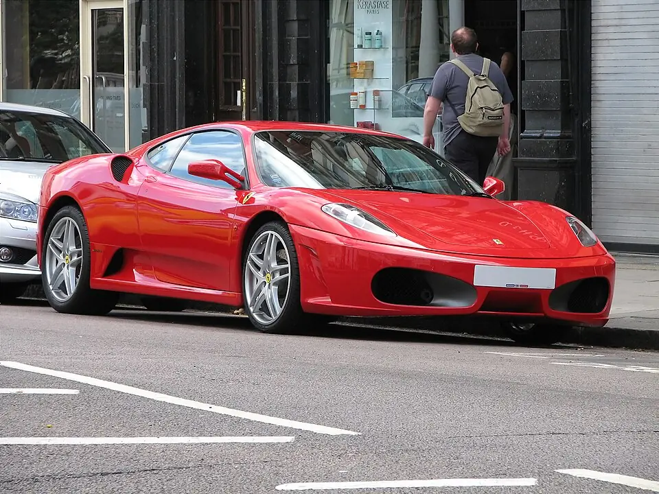 Red Ferrari F430, three-quarter front view