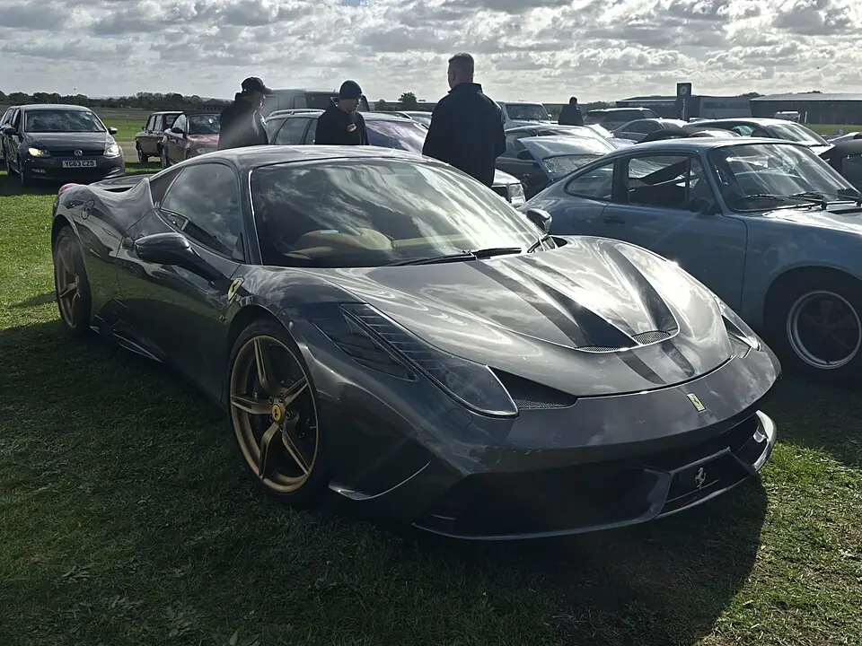 Grey Ferrari 458 Speciale, three-quarter front view