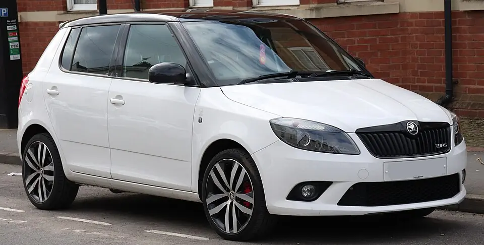 White Škoda Fabia vRS (Mk2) with black roof, front three-quarter view