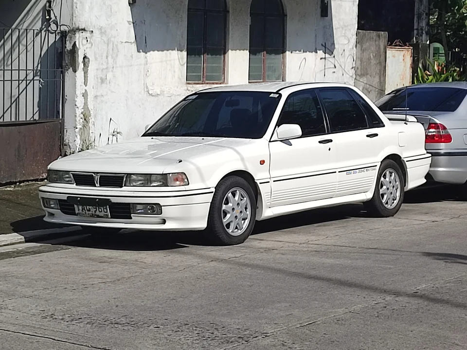 White Mitsubishi Galant VR-4, three-quarter front view