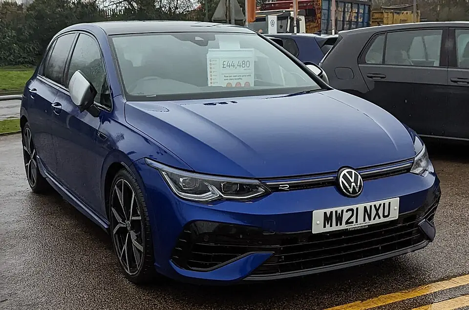 Blue Volkswagen Golf R Mk8, three-quarter front view