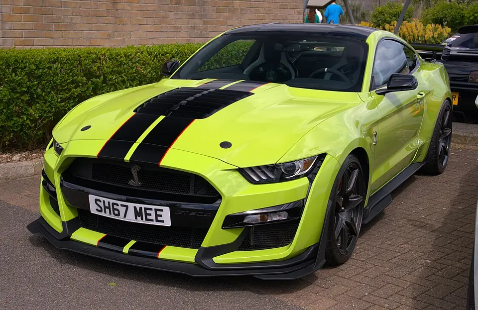 Lime green Ford Mustang Shelby GT500, three-quarter front view