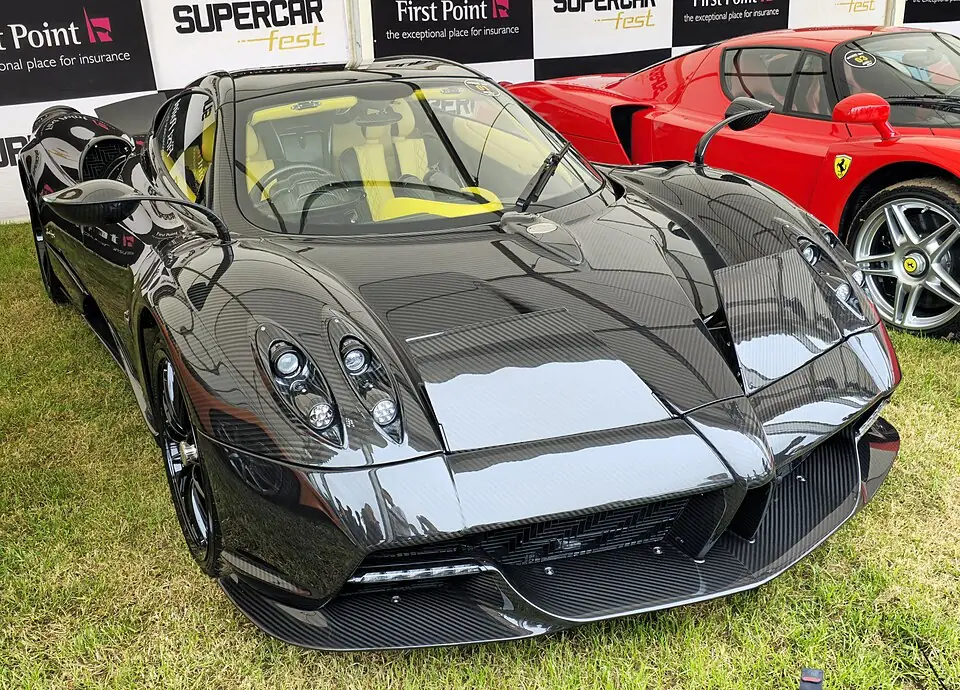 Black carbon-fiber Pagani Huayra, three-quarter front view
