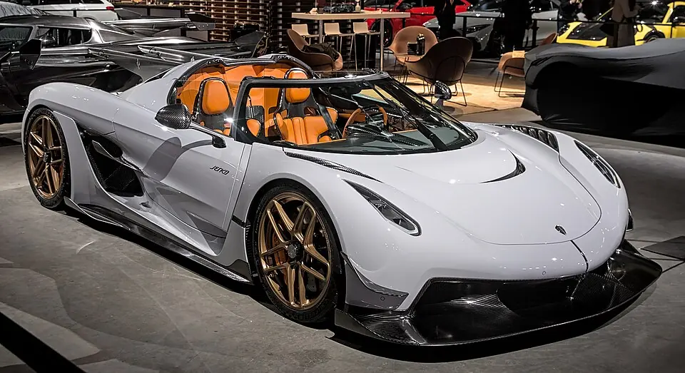 White and gold Koenigsegg Jesko, three-quarter front view