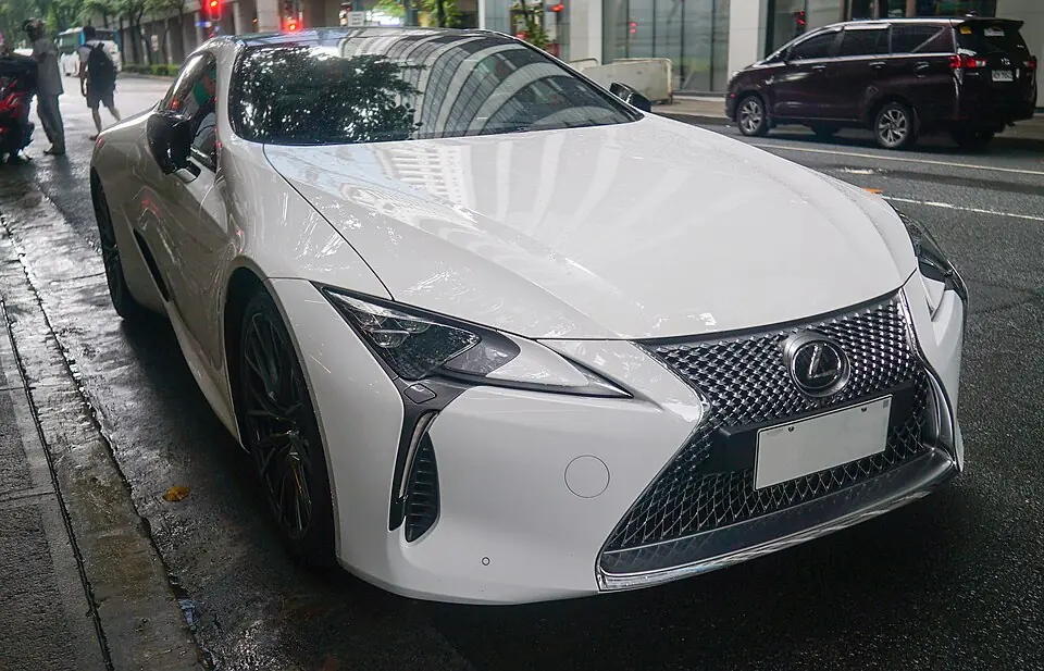 White Lexus LC 500, three-quarter front view