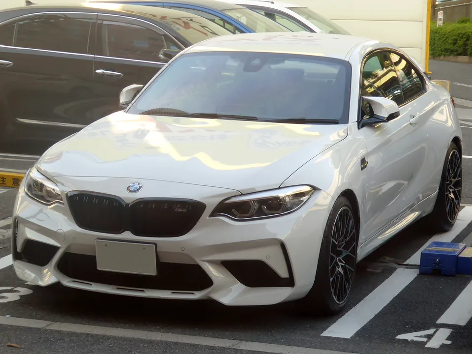 White BMW M2 Competition (F87), three-quarter front view
