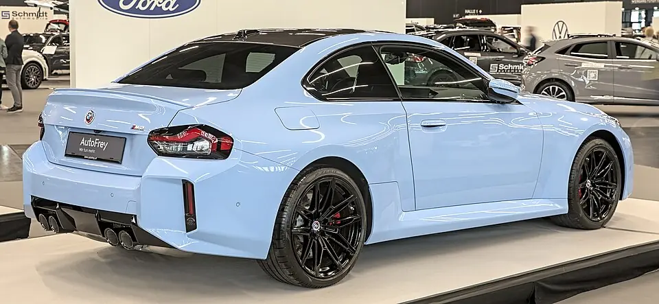 Blue BMW M2 G87, three-quarter front view