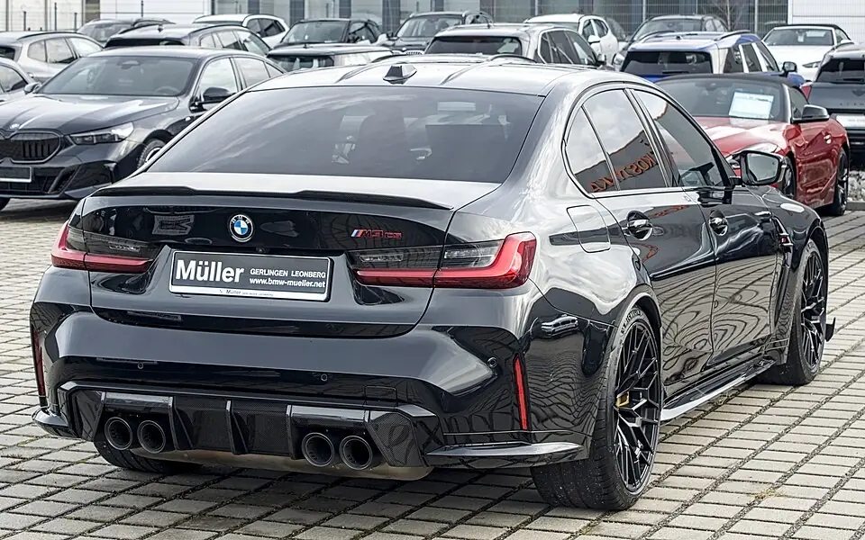 Grey BMW M3 CS (G80), three-quarter front view