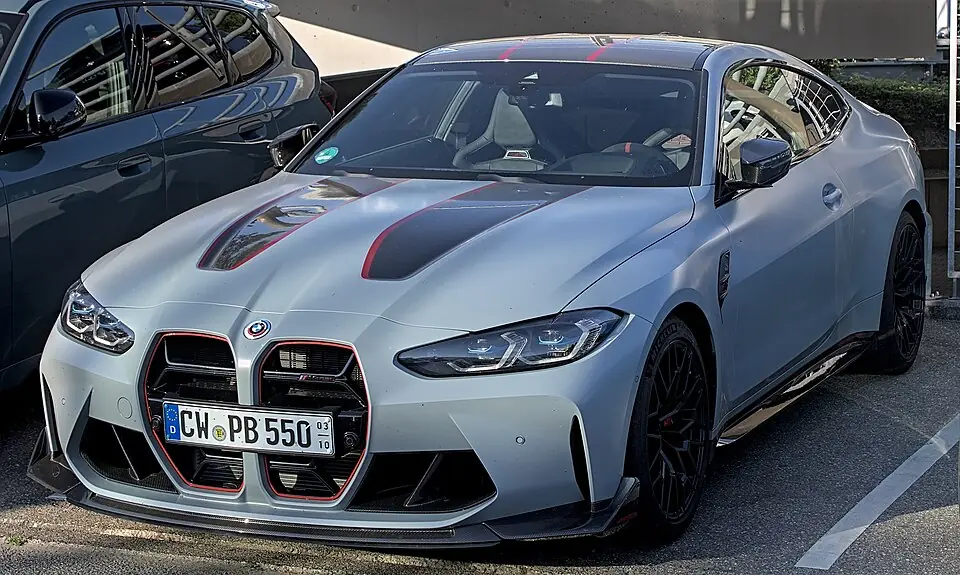 Grey BMW M4 CSL, three-quarter front view