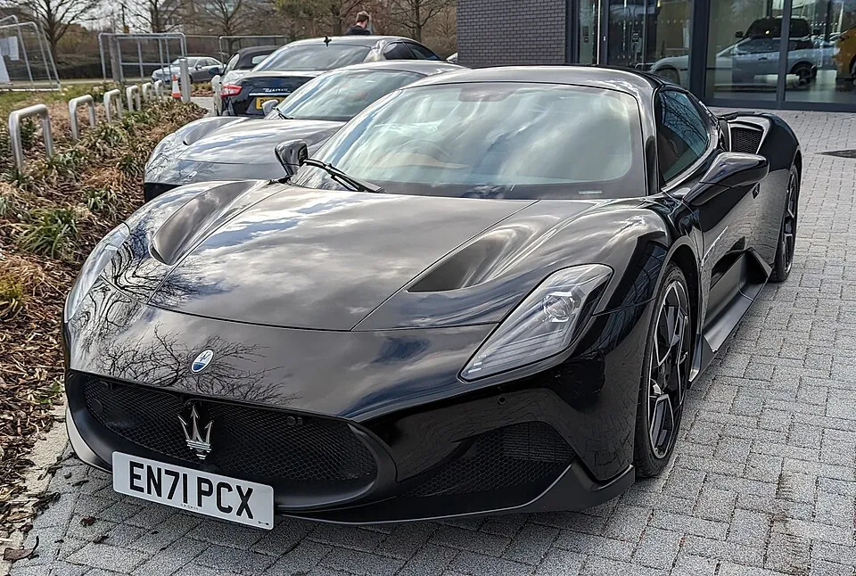 Black Maserati MC20, three-quarter front view