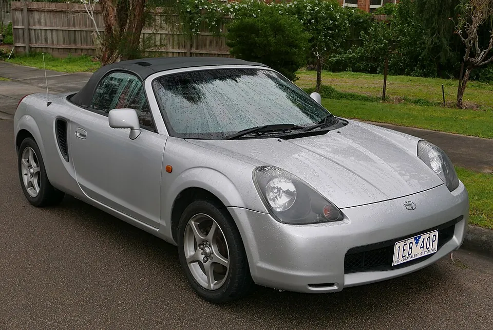 Silver Toyota MR2 Spyder (ZZW30) with the roof up, front three-quarter view
