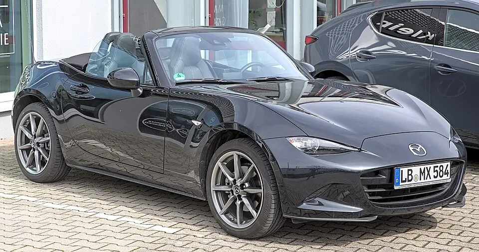 Red Mazda MX-5 ND roadster, three-quarter front view