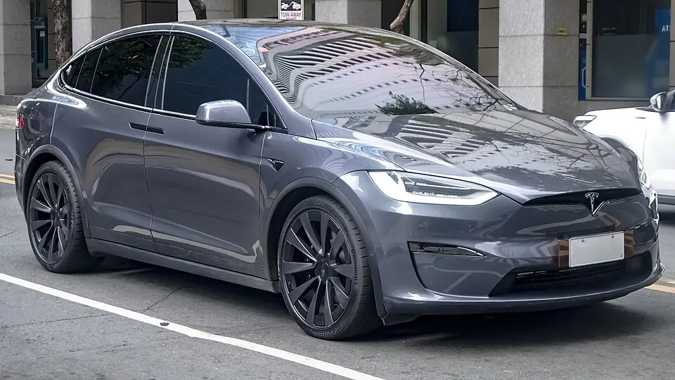 Grey Tesla Model X Plaid, three-quarter front view