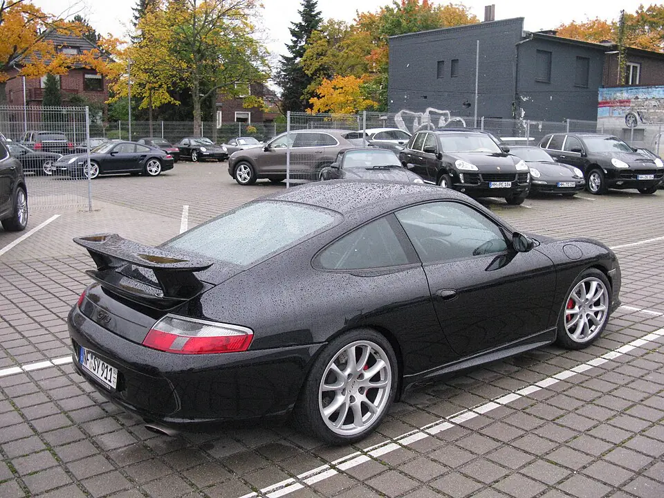 Black Porsche 911 GT3 (996), rear three-quarter view