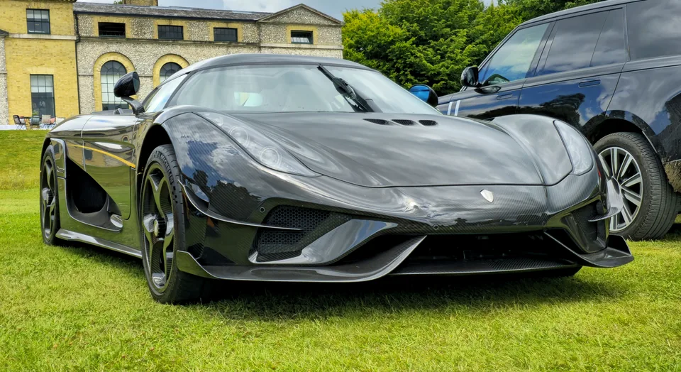 Black Koenigsegg Regera, three-quarter front view
