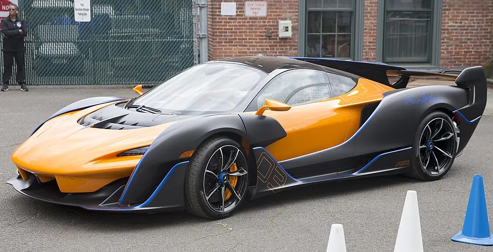 Orange and black McLaren Sabre, three-quarter front view