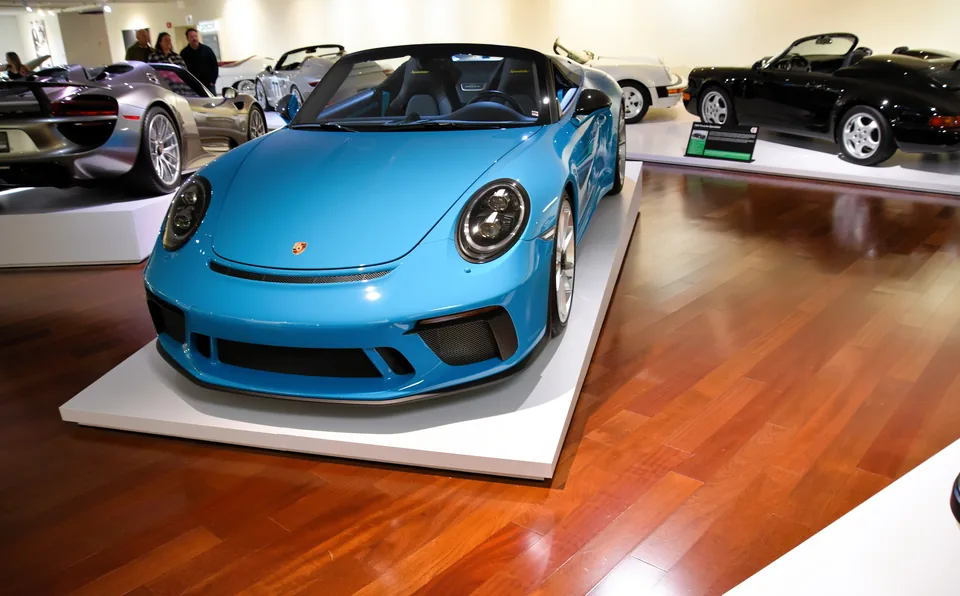 Blue Porsche 911 Speedster (991.2) with double-bubble tonneau, three-quarter front view