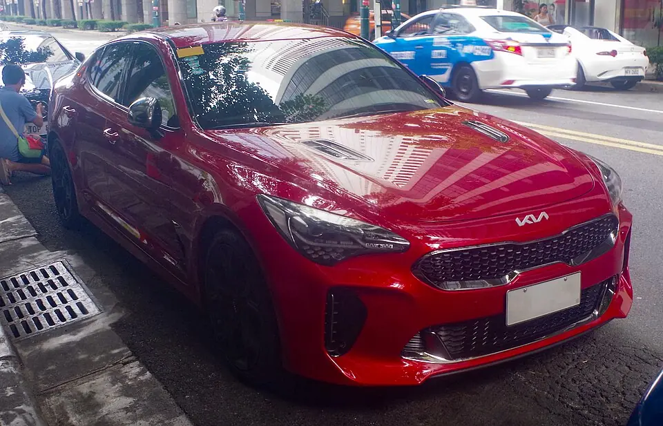 Red Kia Stinger GT, three-quarter front view