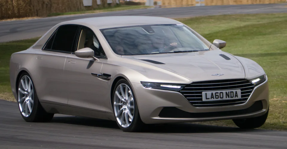 Silver Aston Martin Lagonda Taraf on the Goodwood hillclimb, three-quarter front view
