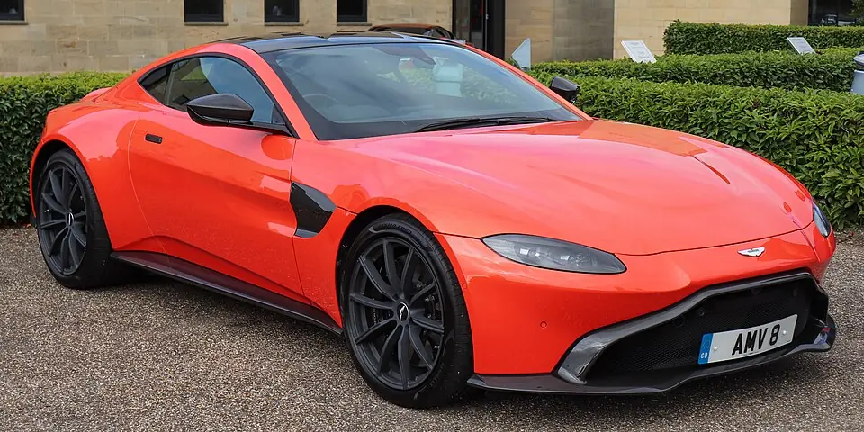 Green Aston Martin Vantage, three-quarter front view