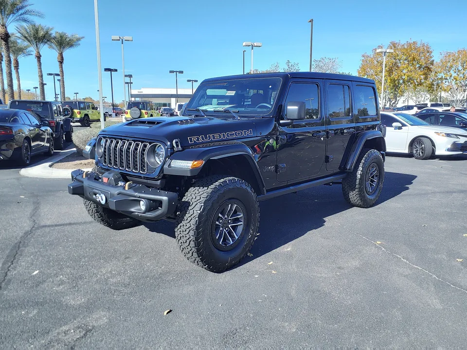 Black Jeep Wrangler Unlimited Rubicon 392, three-quarter front view