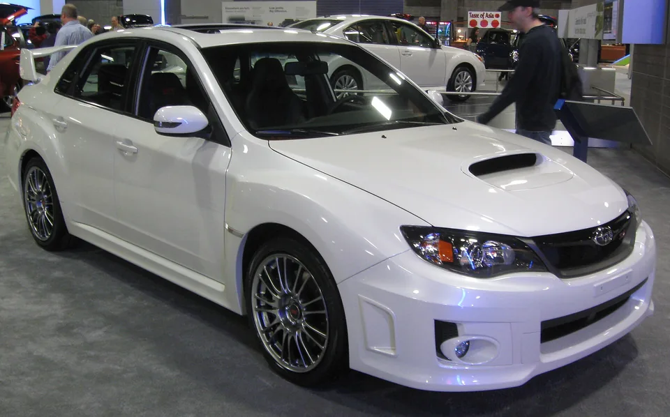 White Subaru Impreza WRX STI (GVB) sedan, three-quarter front view