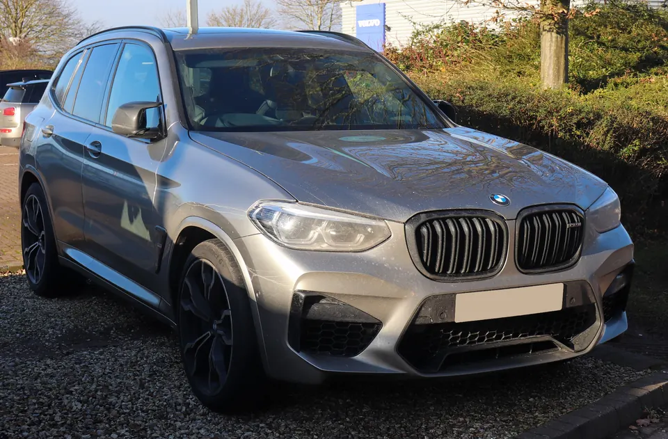 Grey BMW X3 M Competition (F97), front three-quarter view