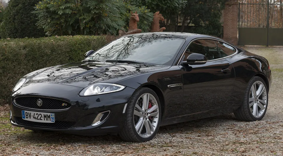 Black Jaguar XKR (X150) coupé, front three-quarter view