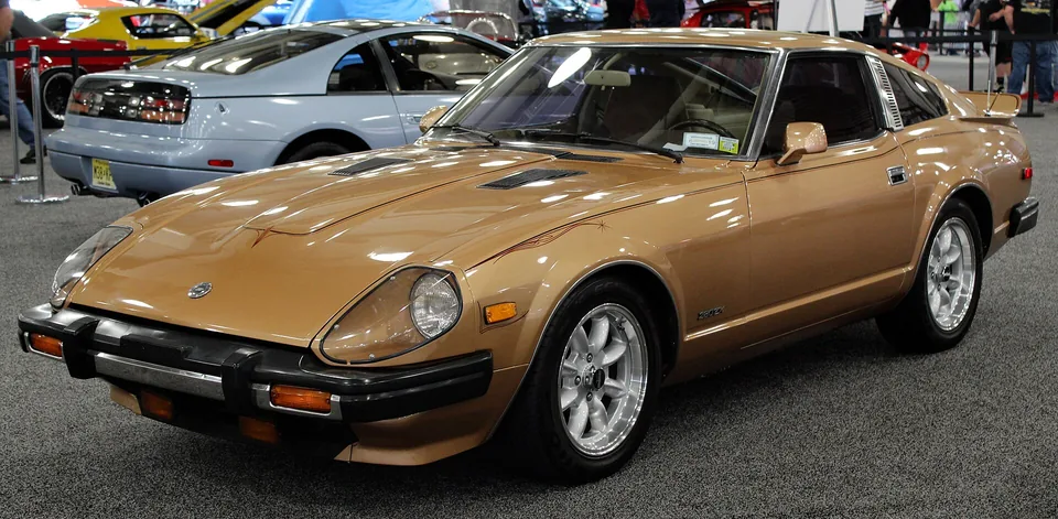 Gold Datsun 280ZX (S130) two-seater, three-quarter front view