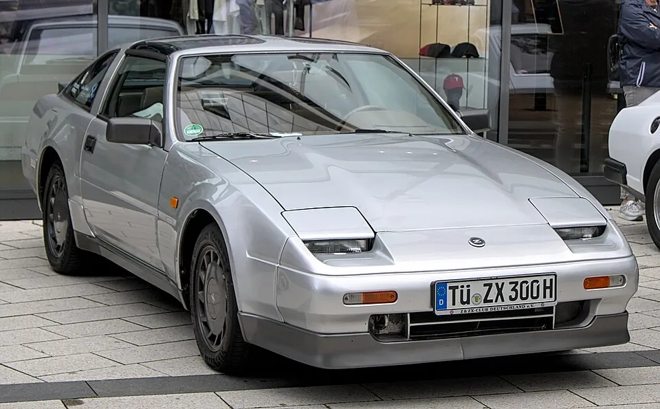 Silver Nissan 300ZX (Z31) with pop-up headlamps, front three-quarter view