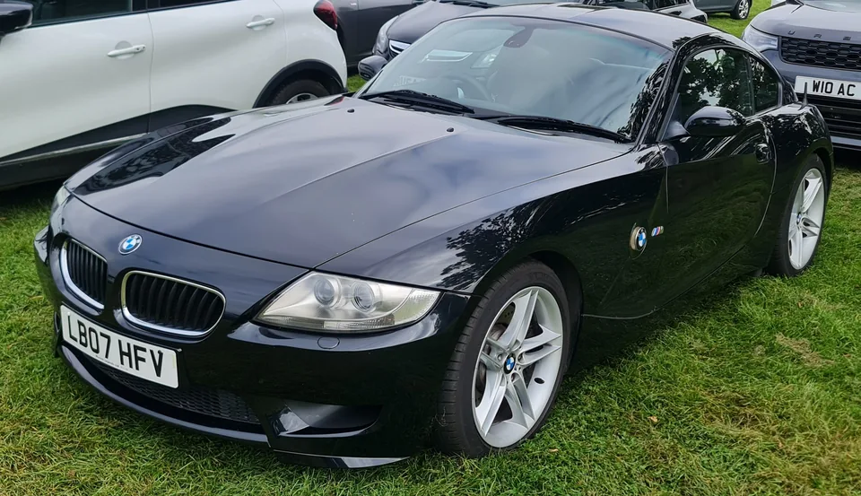 Black BMW Z4 M Coupé (E86), three-quarter front view